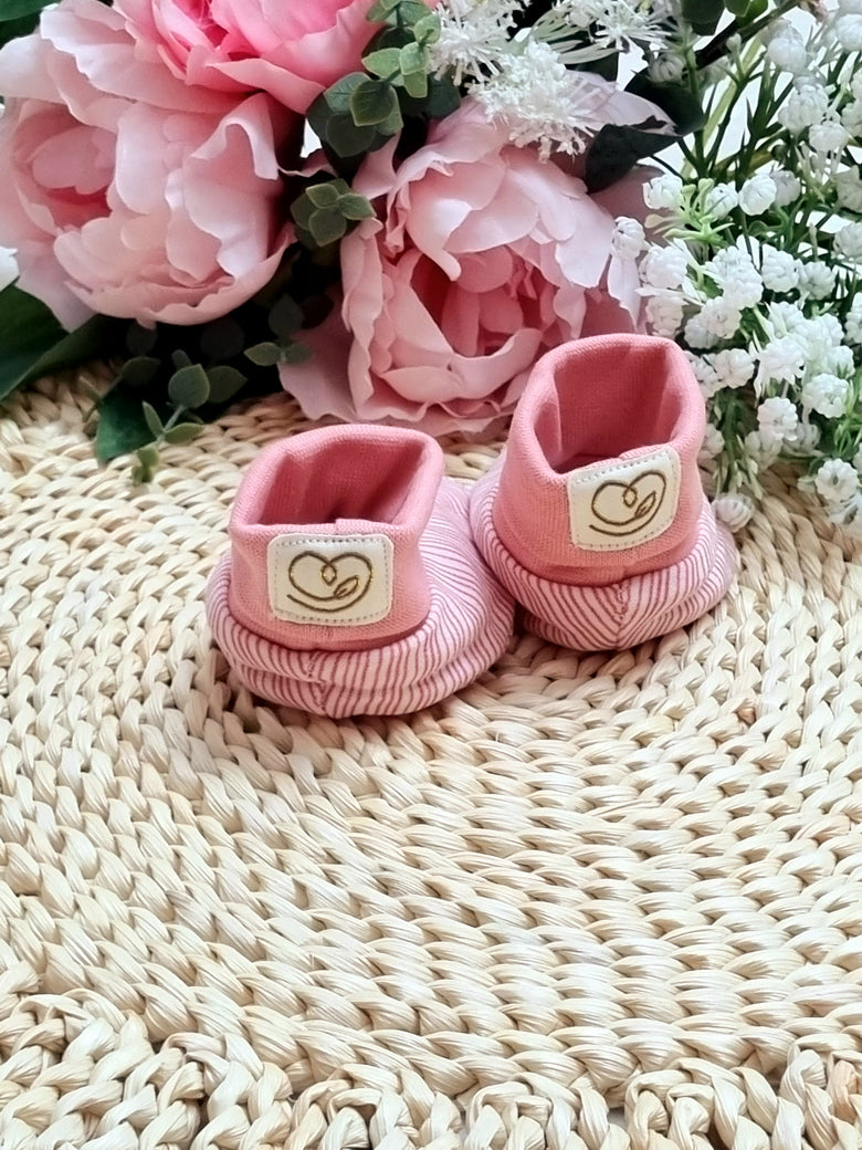 Pink striped baby shoes